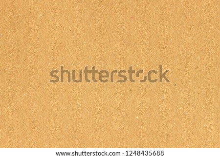 brown cardboard texture useful as a background, soft pastel colour Royalty-Free Stock Photo #1248435688