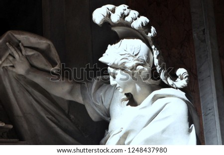 One of the allegorical statues symbolising religion, law and magnificence on the right hand side of the Pope Gregory XIII's monument in Saint Peter's Basilica in Vatican, Rome. Royalty-Free Stock Photo #1248437980