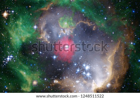 Nebulae and stars in outer space, glowing mysterious universe. Elements of this image furnished by NASA.