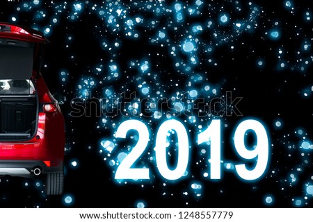 Car tail light red color with 2019 on black background for customers. Using wallpaper or background for transport or automotive automobile and happy new year 2019 image.