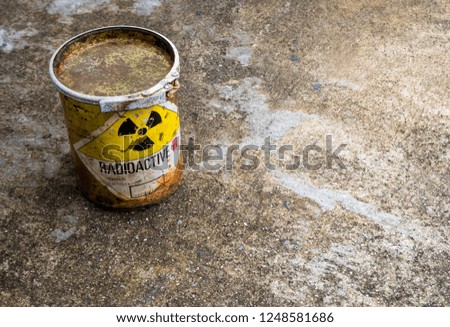 Old and rusted cylinder shape container of Radioactive material
