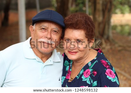 Tender older ethnic couple candid  