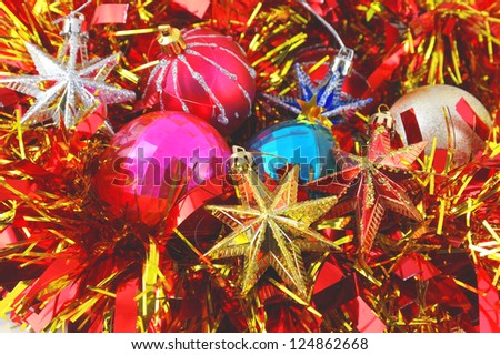 Christmas background with color balls, stars and decoration