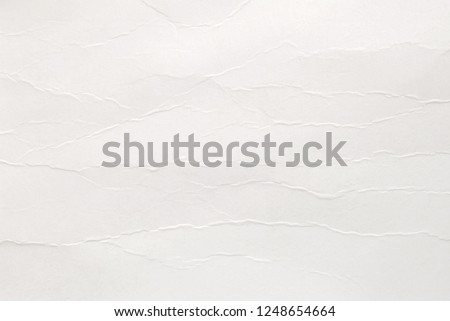 A sheet of white wrinkled paper, white clean poster paper texture