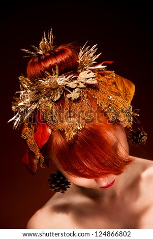 Red Hair Female with luxurious Hair Style and makeup