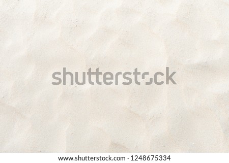 Close-up Fine beach sand in the summer sun as background