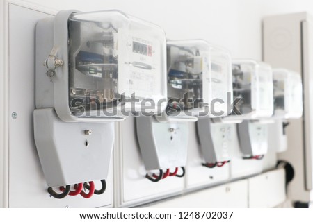 Electrical equipment.energy meter is a device that measures the amount of electric energy consumed by a residence, a business, or an electrically powered device Royalty-Free Stock Photo #1248702037