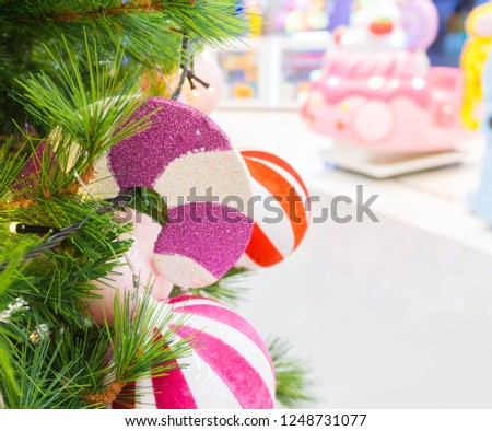 Christmas tree for background of de-focused light with decorated gift.