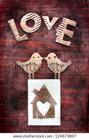 Vintage holidays card with a two birds and heart as a symbol of love/valentines day card with word "love"