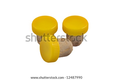 Three yellow corks isolated on white