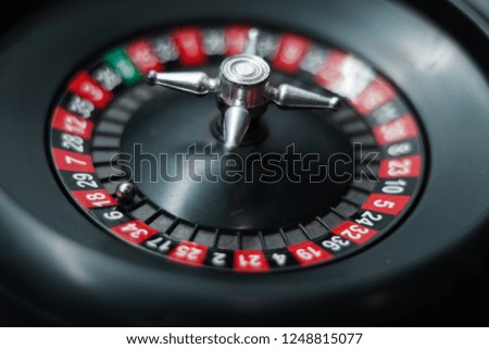 picture of a roulette in a casino.