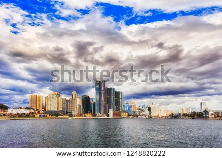 Modern urban cityscape of Sydney with high-rise towers of Sydney harbour.