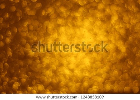 Abstract golden glitter background, perfect for Christmas, New Year, Birthday and other celebrations