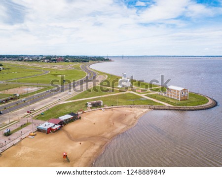 Aerial view of Encarnacion in Paraguay overlooking the San Jose beach and the bridge to Posada/Argentina.