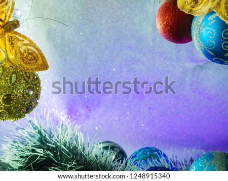 Fir tree decoration. New Year 2019. Light background. New Year mood, Christmas tree toys. Lights, bokeh. festive. Merry Christmas Abstract Blurred Christmas Lights Background. Copy space for design.
