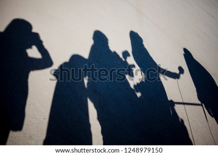Shadows of journalists and photographers who interview Royalty-Free Stock Photo #1248979150