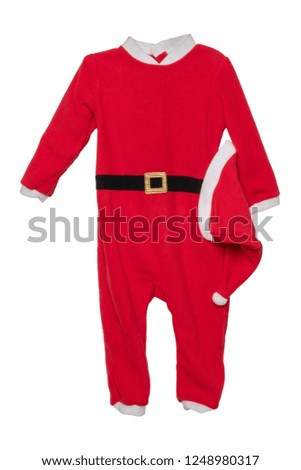 Christmas clothes. Close-up of red kids Christmas Santa Claus jumpsuit with holding hat isolated on a white background.