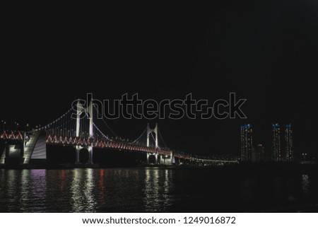 Night bridge on the background is blurred