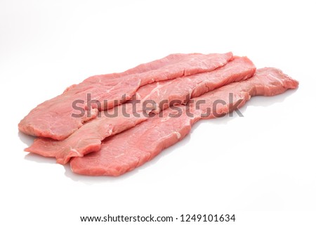 Veal cutlets escalope meat raw white isolated Royalty-Free Stock Photo #1249101634