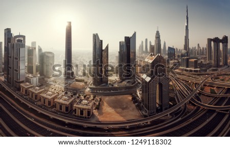 Dubai skyline in the morning, panoramic aerial top view to downtown city center landmarks at sunrise. Famous viewpoint, United Arab Emirates