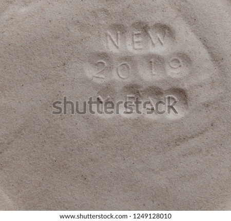 Letters on White Sand New 2019 Year