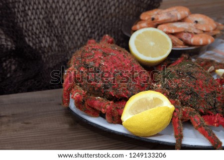 fresh seafood with lemon, spider crabs