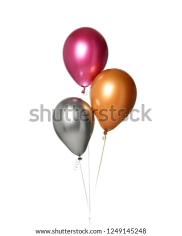 Bunch of big purple silver and gold latex balloons objects for birthday party isolated on a white background