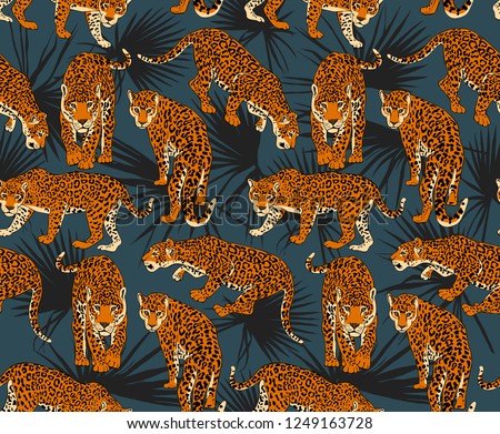 Seamless pattern. Jaguars and a Tropical exotic palm leaves on a dark background. Textile composition, hand drawn style print. Vector illustration.