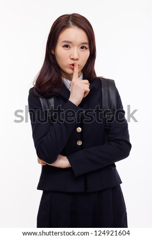 Young Asian student showing calm sign  isolated on white background.