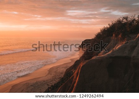 Scenic ocean sunset in Carlsbad California Royalty-Free Stock Photo #1249262494