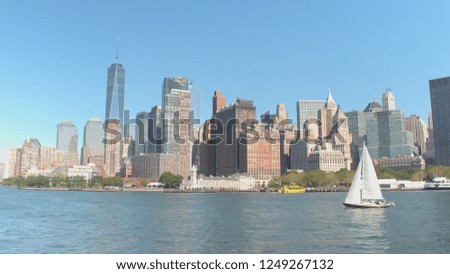 Famous NYC landmarks in Downtown Manhattan from a vantage point on the water