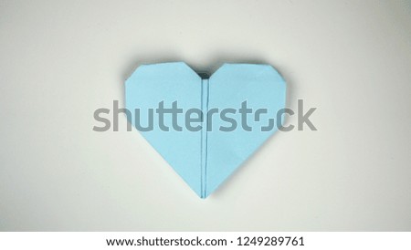 Origami heart. Minimalist concept          