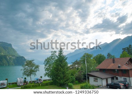 I take pictures of the town of Brienz in a train to Interlaken, Switzerland.