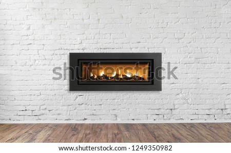 Gas Fireplace on white brick wall in bright empty living room interior of house.