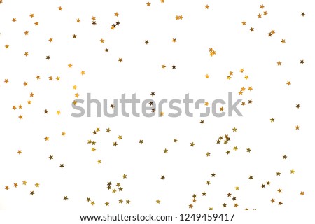 Bunch of gold stars on white background. Festive concept.
