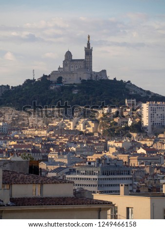 Overview of Marseille, France from Marseille train station. In the distance on the hill there is the Notre Dame de la Garde Cathedral.