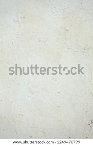 whitewashed uneven wall with yellowish stains,vertical
 textured background