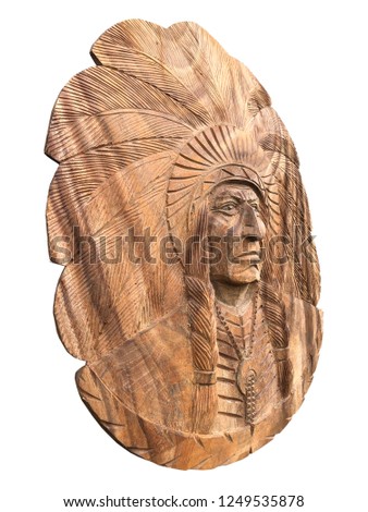 My sculpture and my handmade, not the place. Apache, Red indian head Carved with wood, isolated on white background.