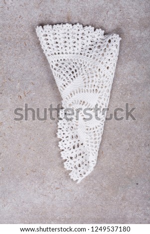 lace on concrete background