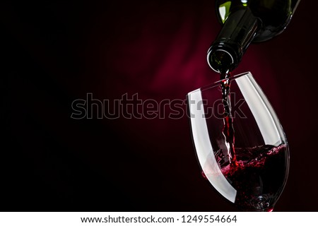 Pour wine in a glass