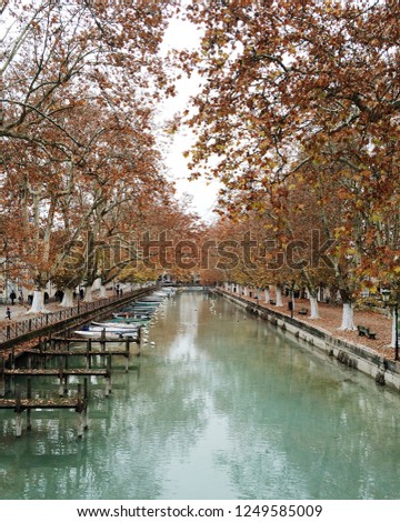 View of Annecy canal in autumn