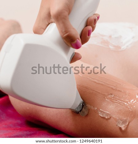 Hair removal cosmetology procedure for man at beauty salon