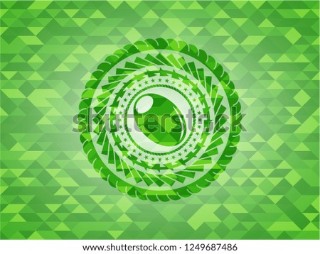 olive icon inside green emblem with mosaic ecological style background