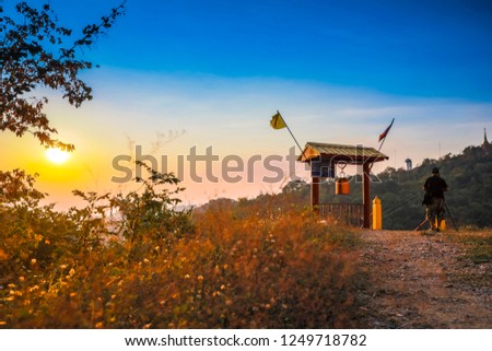 Thai temple on the hill, Man Taking photo At the top of  mountain, landmark in Thailand