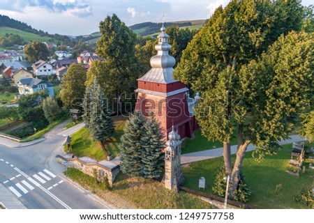 Old church in Tylicz aerial view Royalty-Free Stock Photo #1249757758