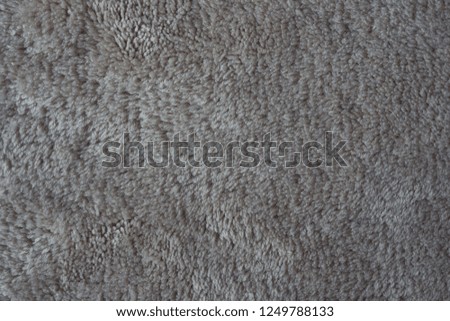 gray carpet background, gray fabric texture background, closeup
