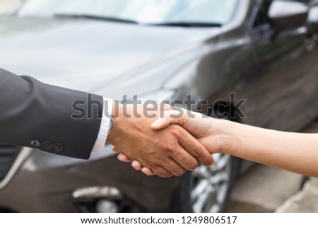 Businessmen shake hands with customers. After agreeing to do business together.