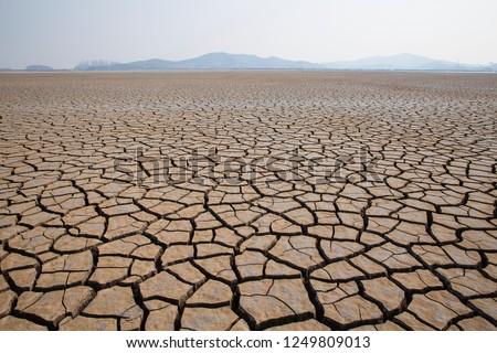 Dried and Cracked Land Royalty-Free Stock Photo #1249809013