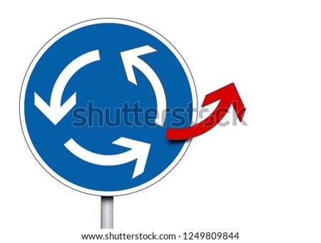 Blue traffic sign with traffic circle - arrows showing another way, choose your way