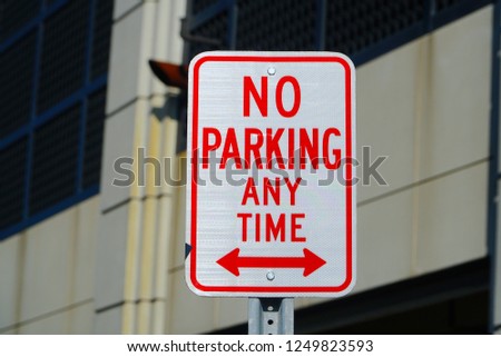 No Parking At Any Time Sign Outside                               